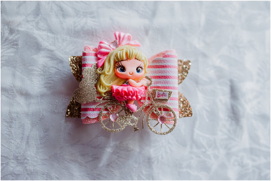 Barbie on a Bike Clay Bow